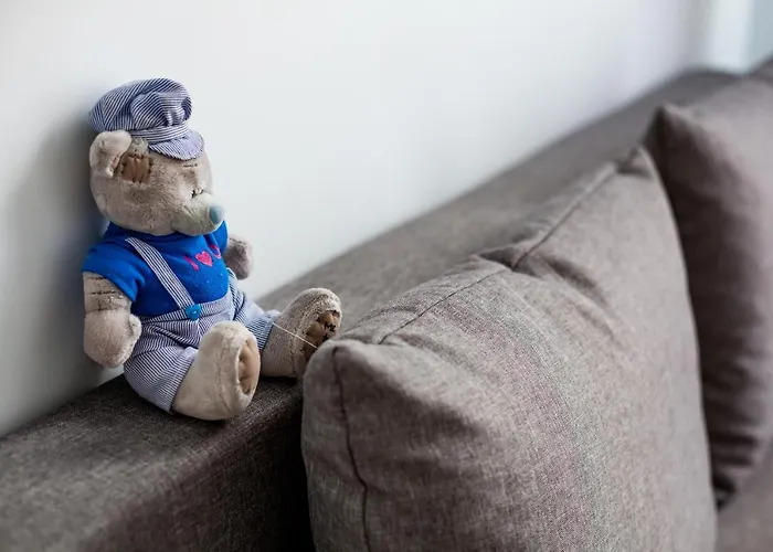 Family In Center With Balcony *