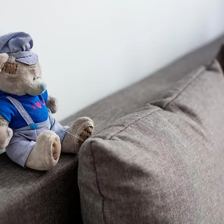 Family In Center With Balcony *