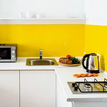 Family In Center With Balcony *